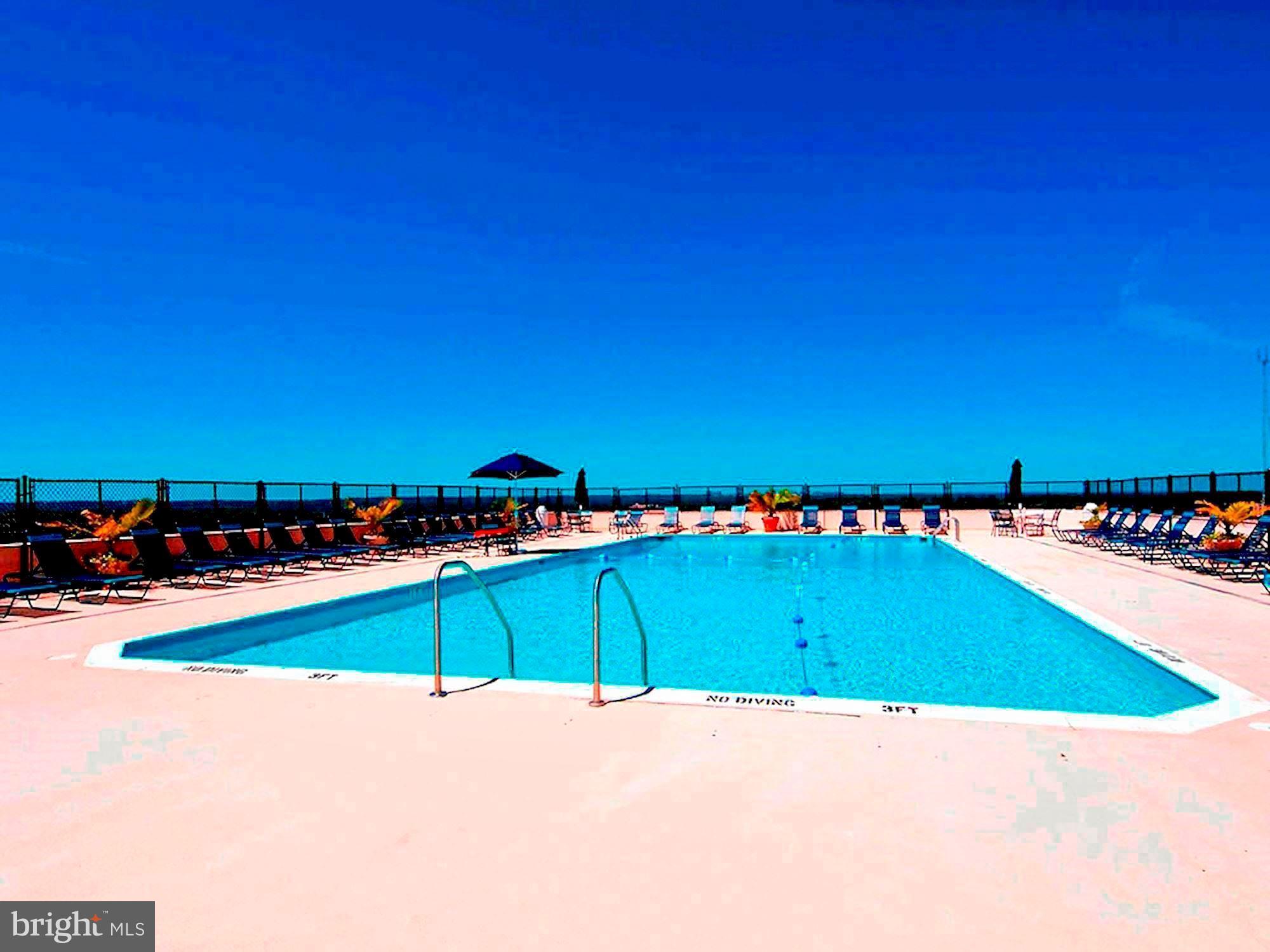 5500 Friendship Boulevard, Unit 2124N Chevy Chase, MD 20815 - Photo 19 of 24 a view of an outdoor space and swimming pool