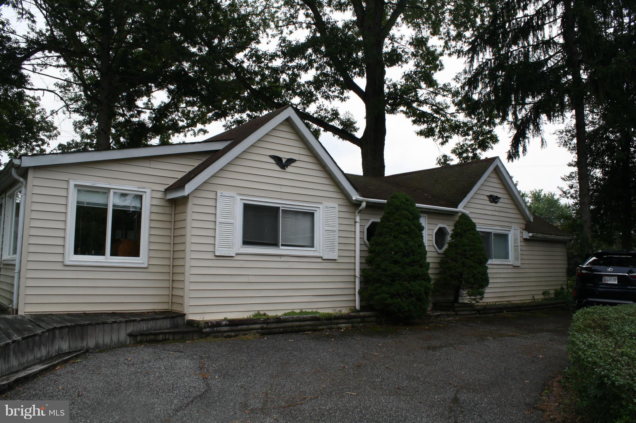 4304 Chapel Road Nottingham, MD 21236 - Photo 5 of 13 a view of a house with a yard