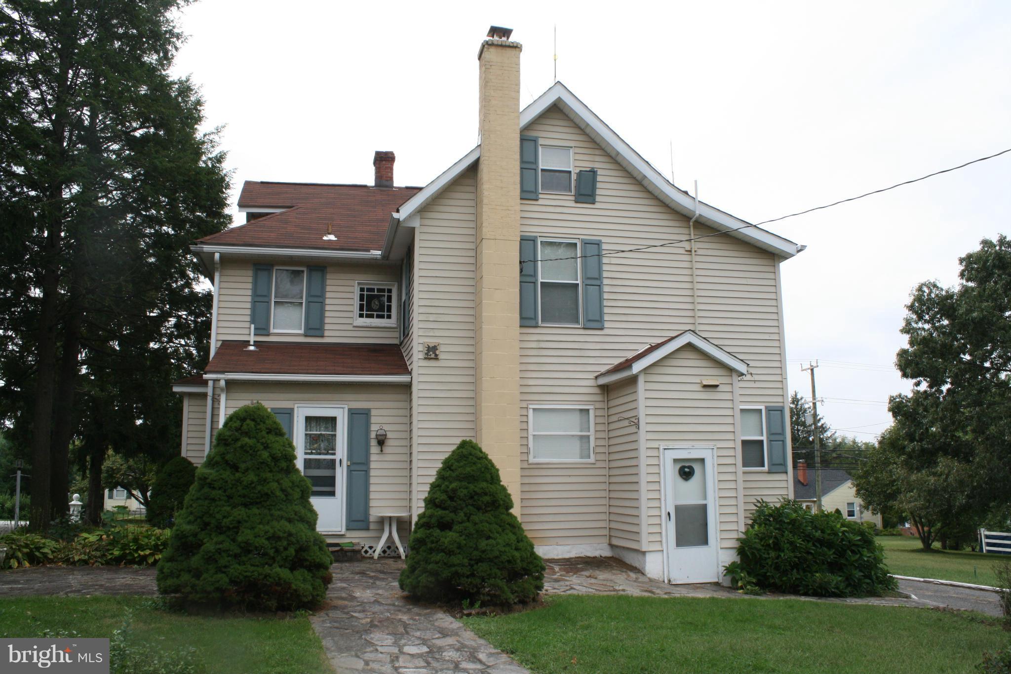 4304 Chapel Road Nottingham, MD 21236 - Photo 6 of 13 a view of a house with a yard