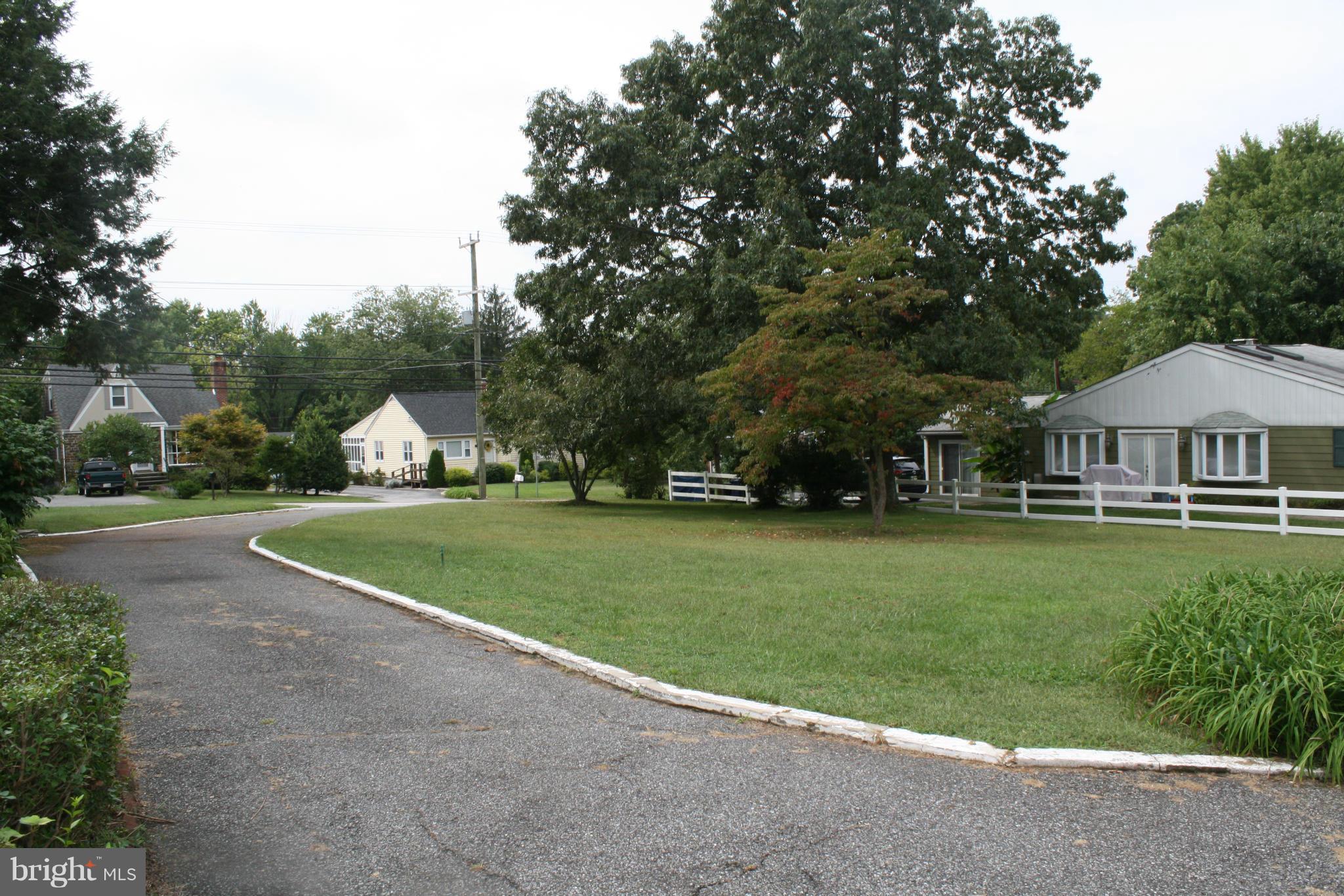 4304 Chapel Road Nottingham, MD 21236 - Photo 8 of 13 a view of house with outdoor space and street view