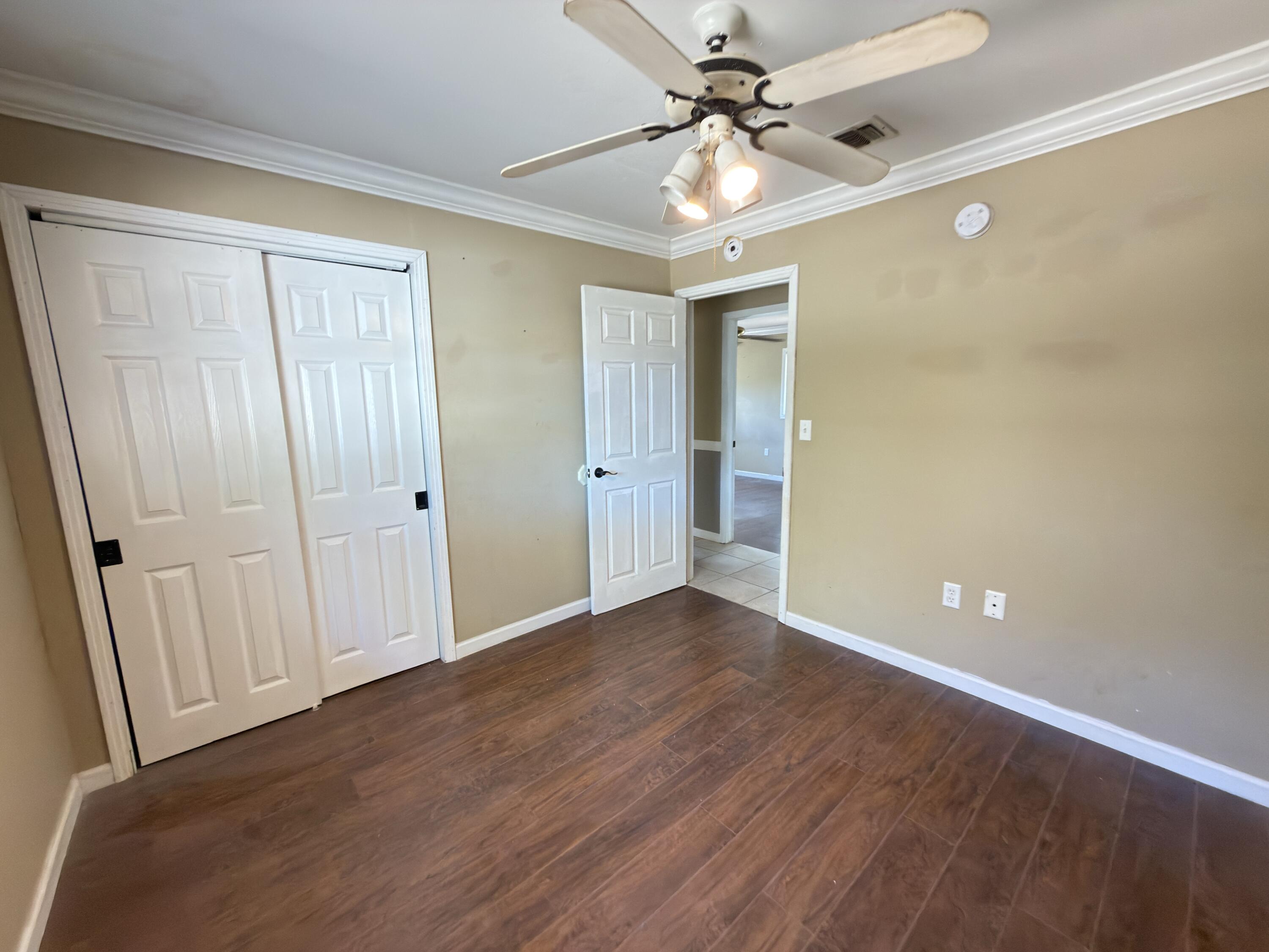 515 Robinson Avenue East Crestview, FL 32539 - Photo 18 of 22 a view of an empty room with a window