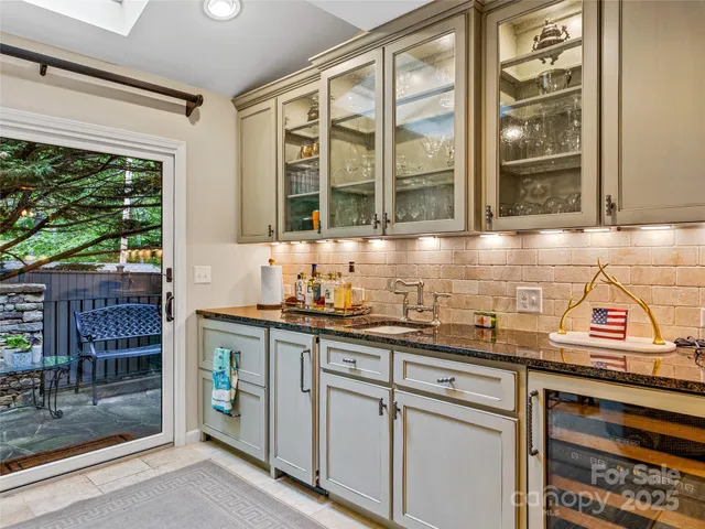 a kitchen with a sink and a window