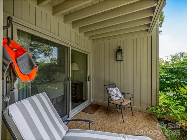 a backyard of a house with seating space
