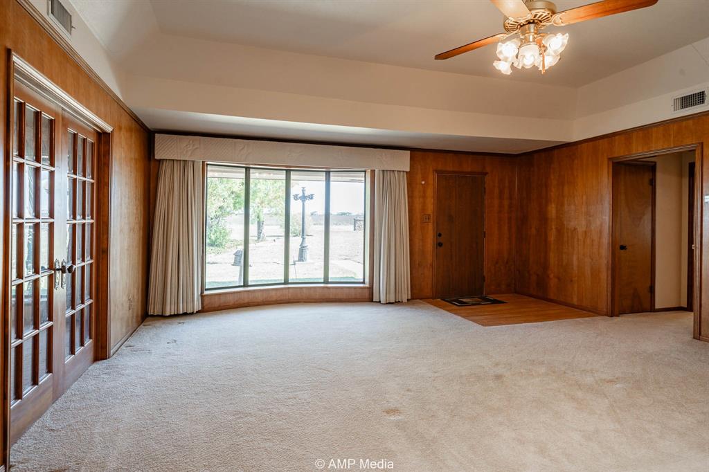 1102 Elmdale Road North Abilene, TX 79601 - Photo 3 of 28 a view of an empty room with a window