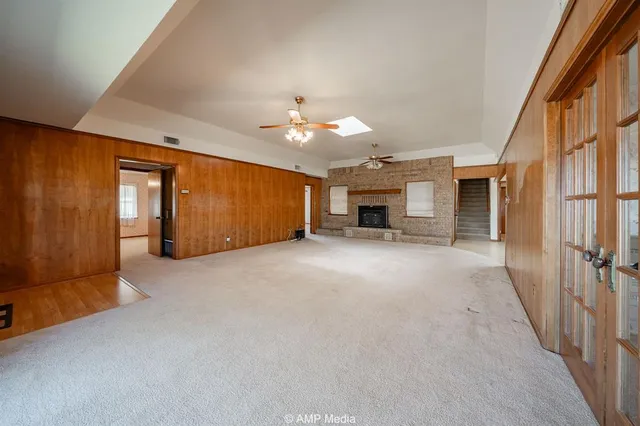 a view of a livingroom with a staircase