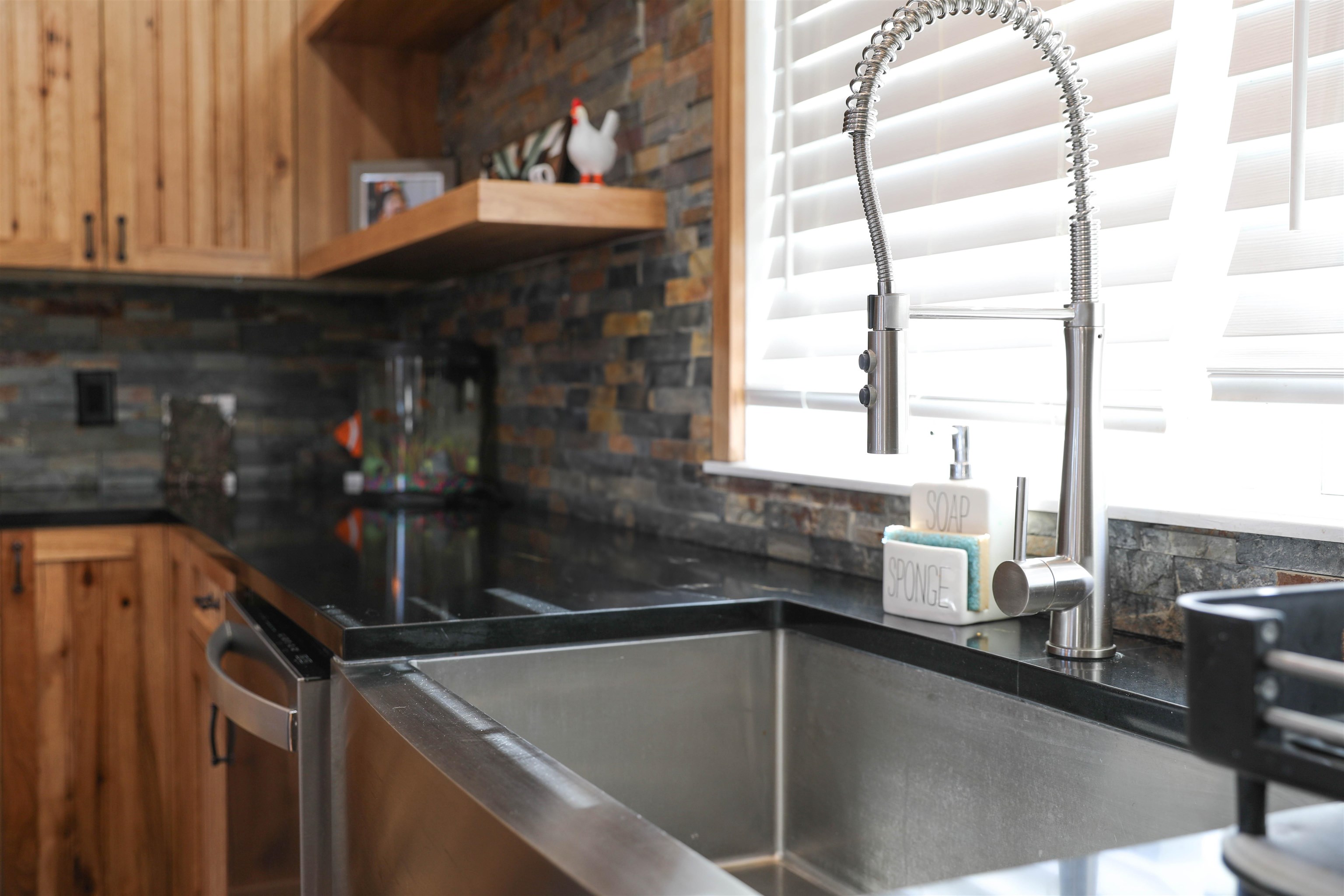 450 Steeles Fort Road Raphine, VA 24472 - Photo 20 of 52 a kitchen with a sink and a window