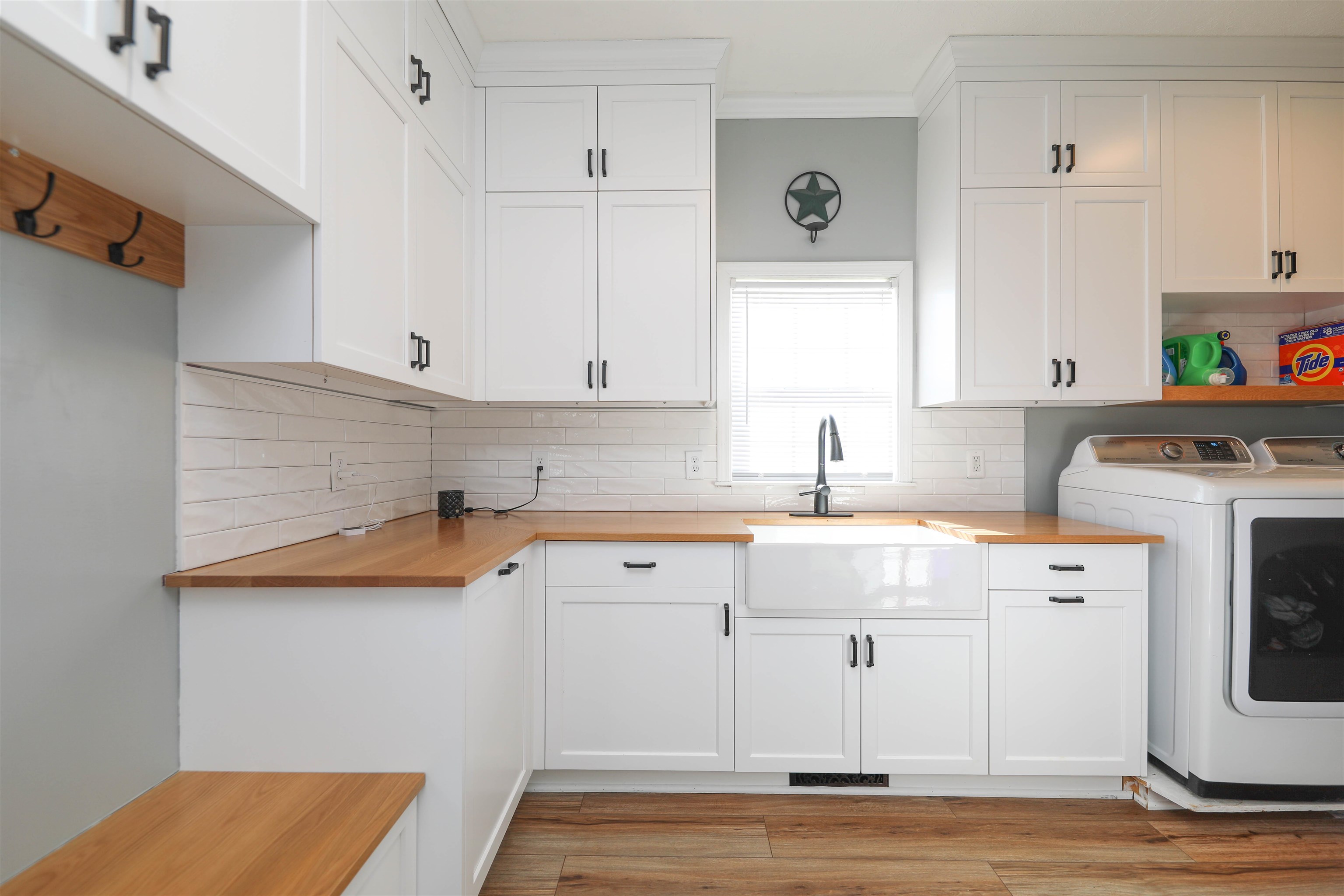 450 Steeles Fort Road Raphine, VA 24472 - Photo 30 of 52 a kitchen with granite countertop a sink a stove and cabinets