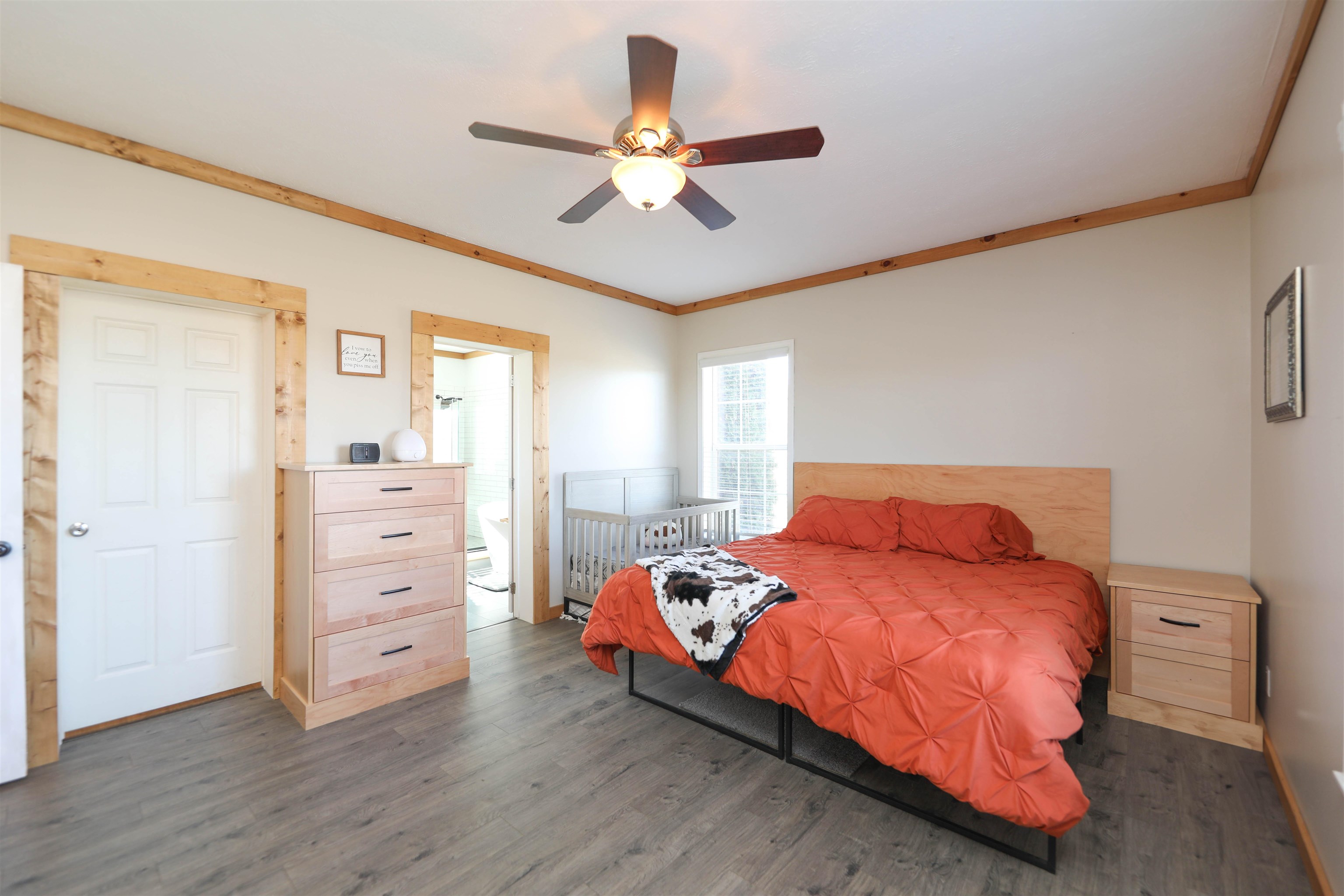 450 Steeles Fort Road Raphine, VA 24472 - Photo 32 of 52 a bedroom with a bed and a ceiling fan