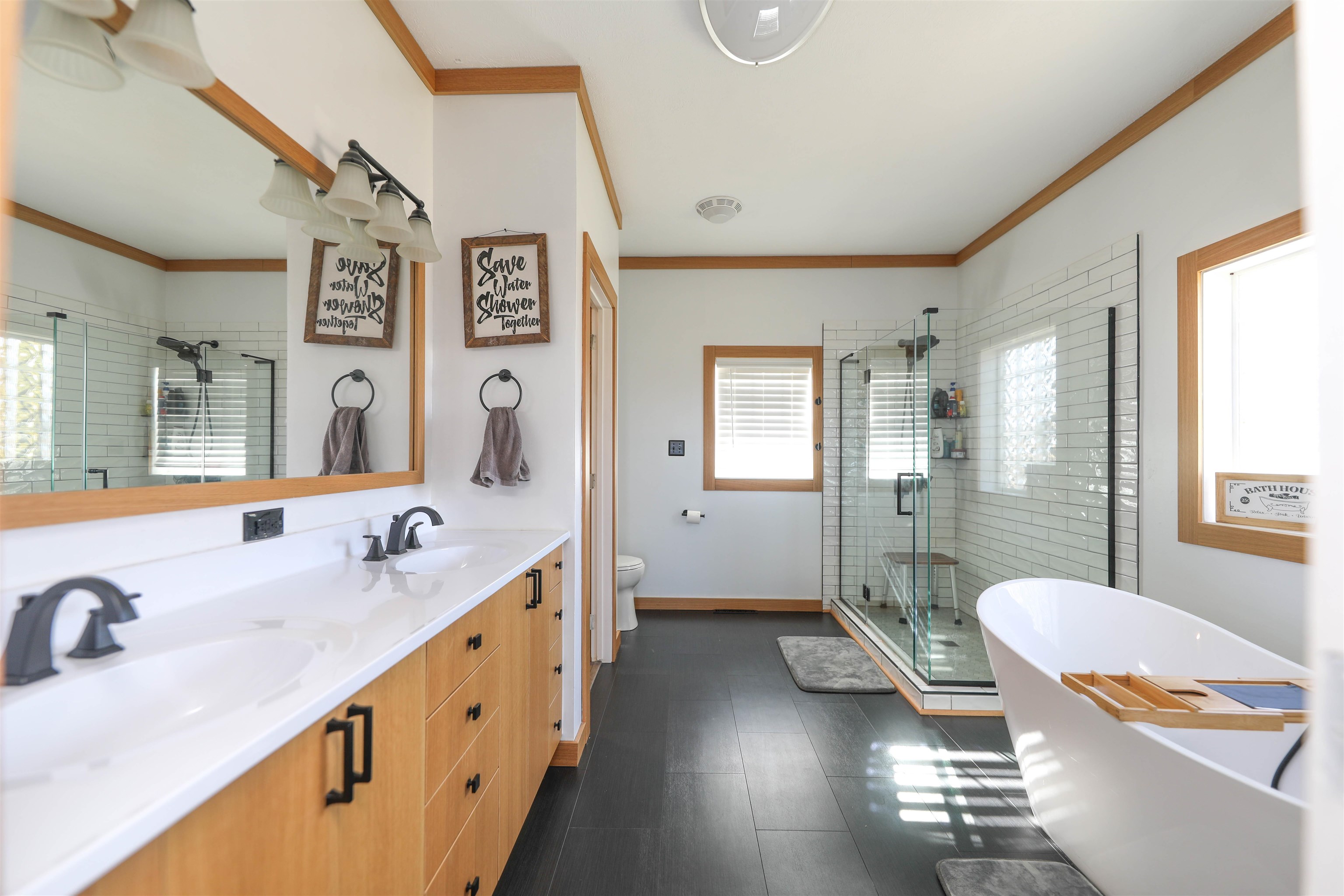 450 Steeles Fort Road Raphine, VA 24472 - Photo 36 of 52 a bathroom with double vanity sinks a mirror and a shower