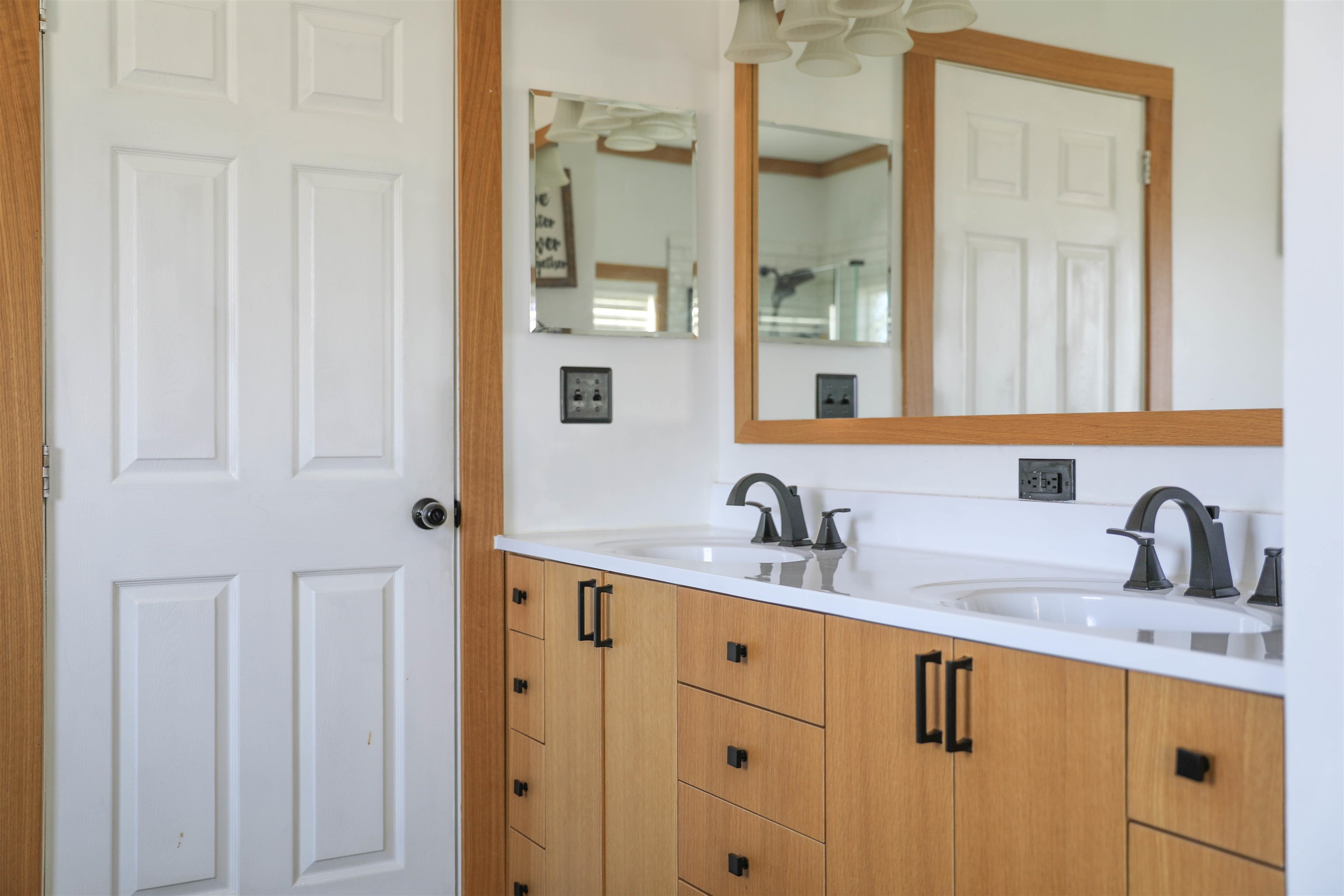 450 Steeles Fort Road Raphine, VA 24472 - Photo 40 of 52 a bathroom with a double vanity sink and mirror