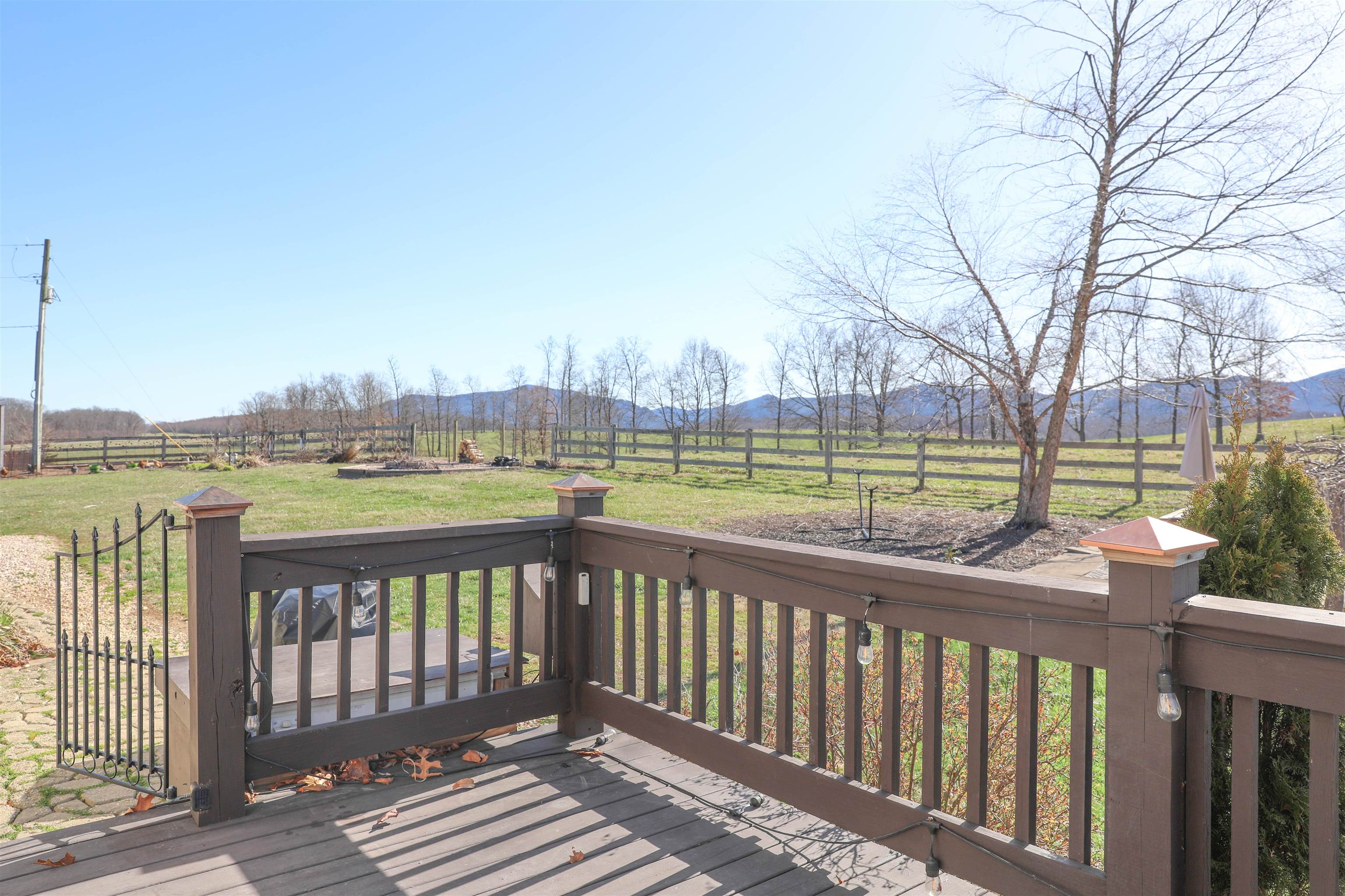 450 Steeles Fort Road Raphine, VA 24472 - Photo 6 of 52 a view of a street with a deck and a yard