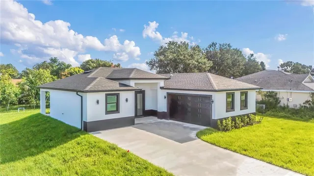 front view of a house with a yard