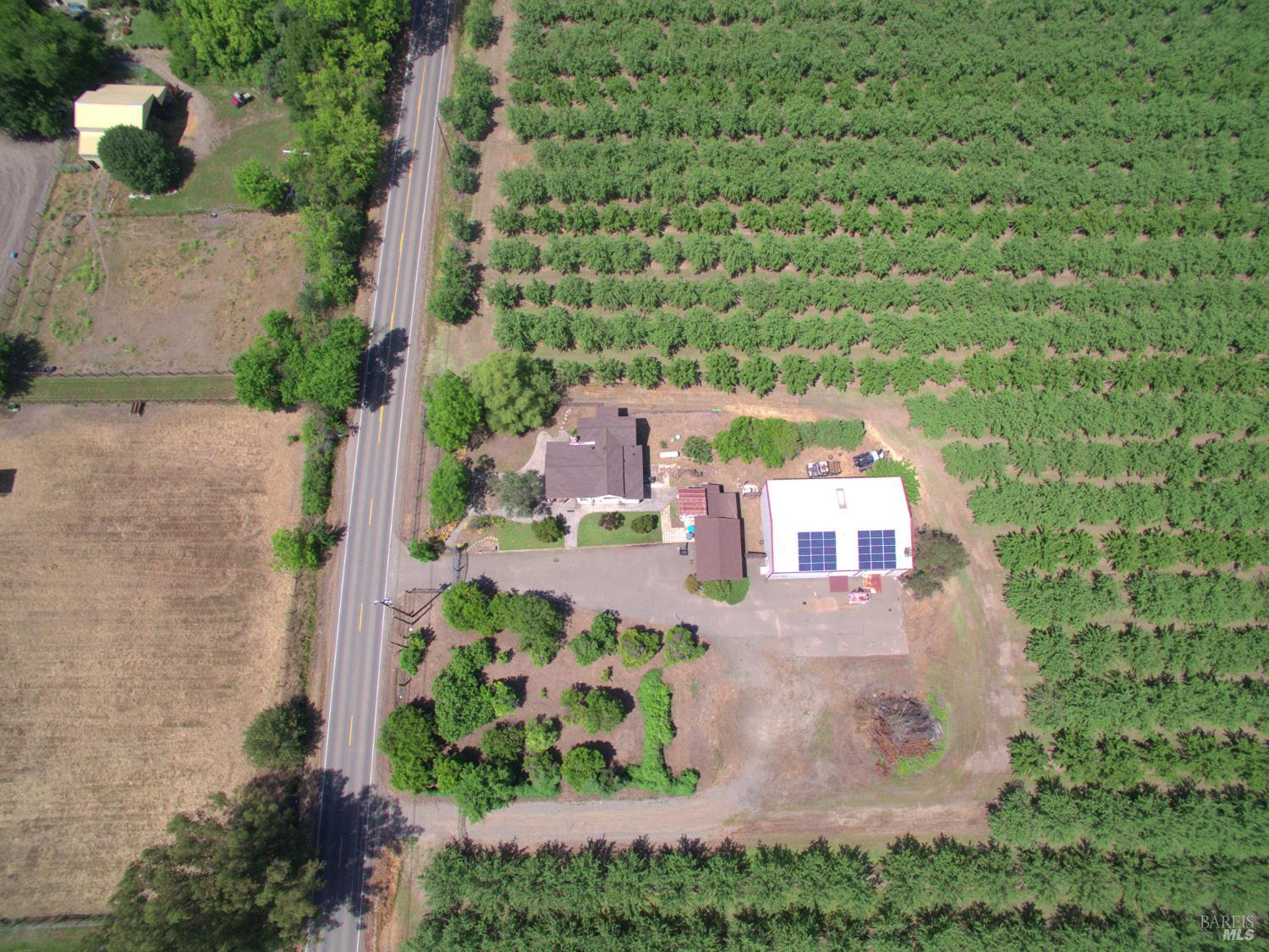7948 North Meridian Road Dixon, CA 95620 - Photo 53 of 59 an aerial view of a house with a yard
