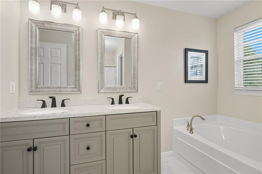 207 Windham Lane Mars, PA 16046 - Photo 23 of 43 a bathroom with a sink and a bathtub