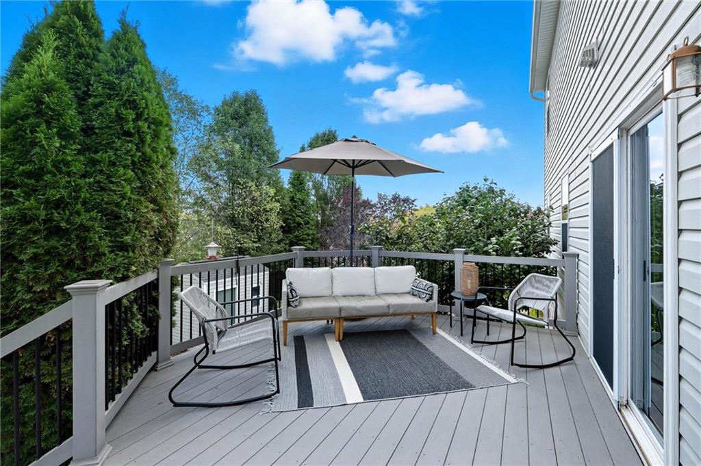 207 Windham Lane Mars, PA 16046 - Photo 38 of 43 a view of balcony with furniture and wooden floor