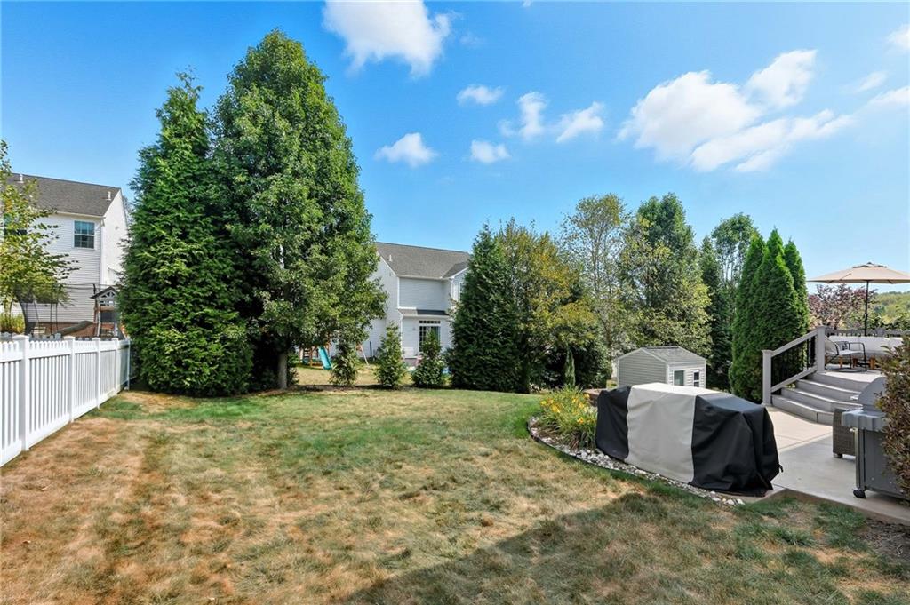 207 Windham Lane Mars, PA 16046 - Photo 41 of 43 a view of a backyard with garden