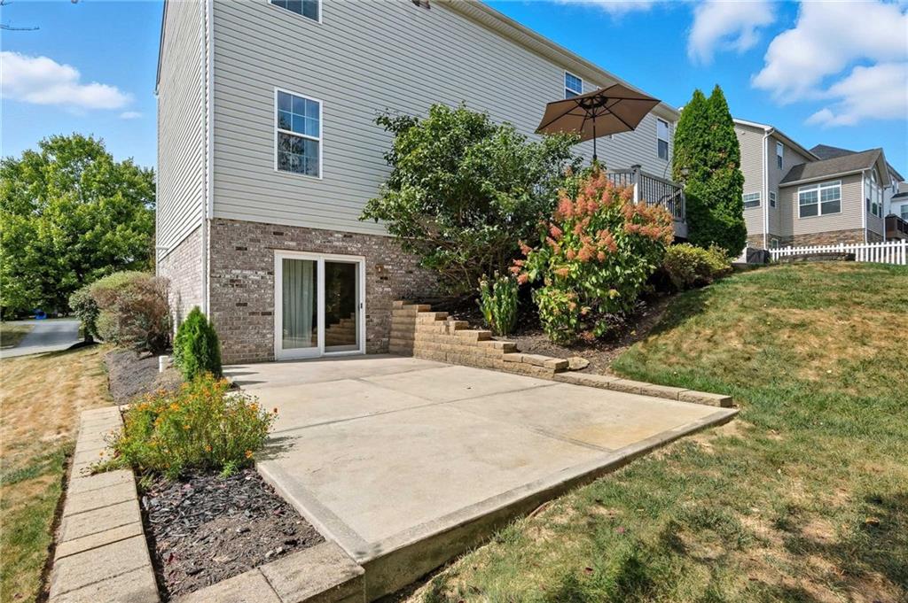 207 Windham Lane Mars, PA 16046 - Photo 42 of 43 a front view of a house with garden