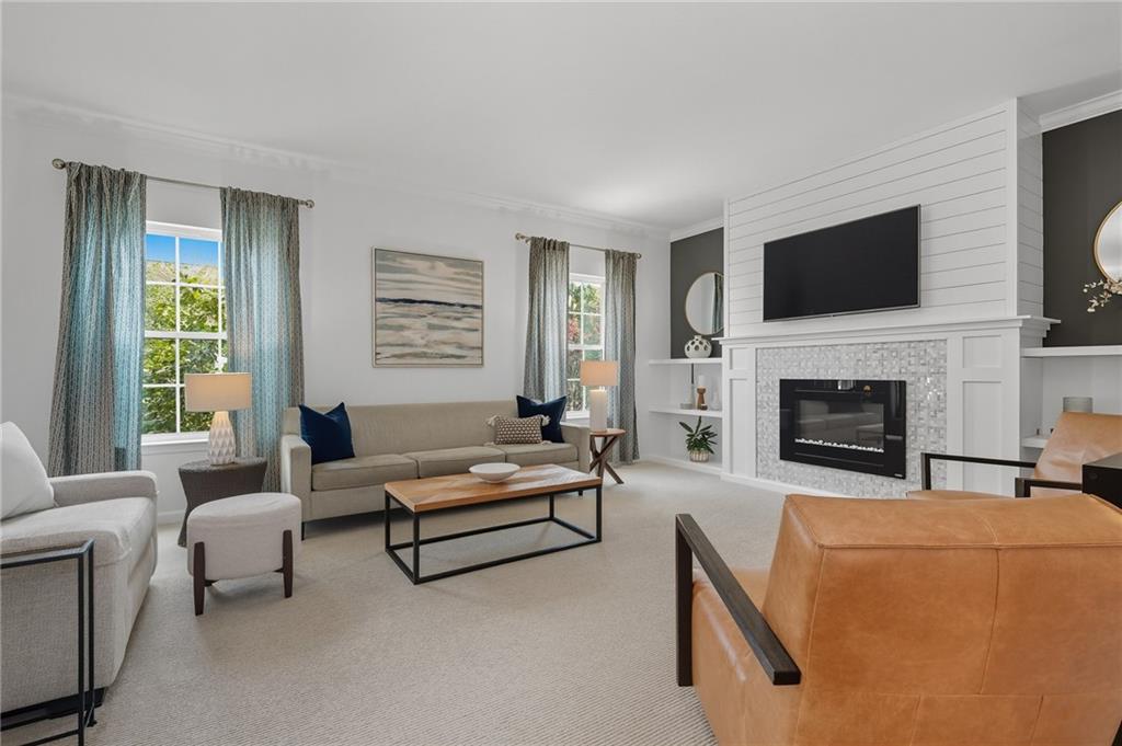 207 Windham Lane Mars, PA 16046 - Photo 6 of 43 a living room with furniture flat screen tv and a fireplace