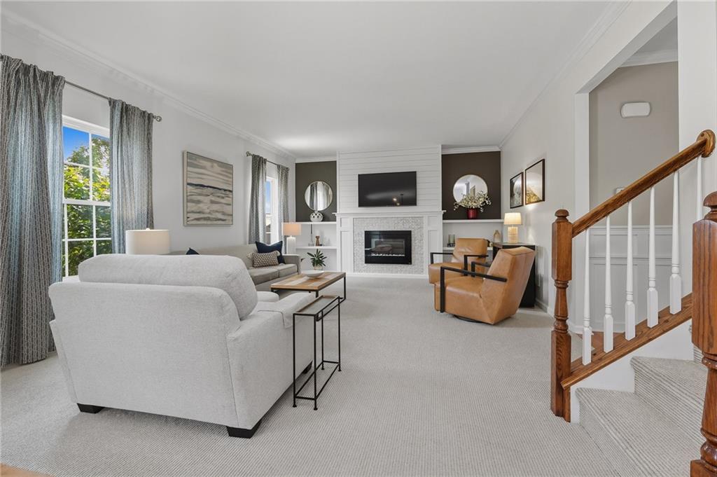 207 Windham Lane Mars, PA 16046 - Photo 8 of 43 a living room with furniture and a fireplace