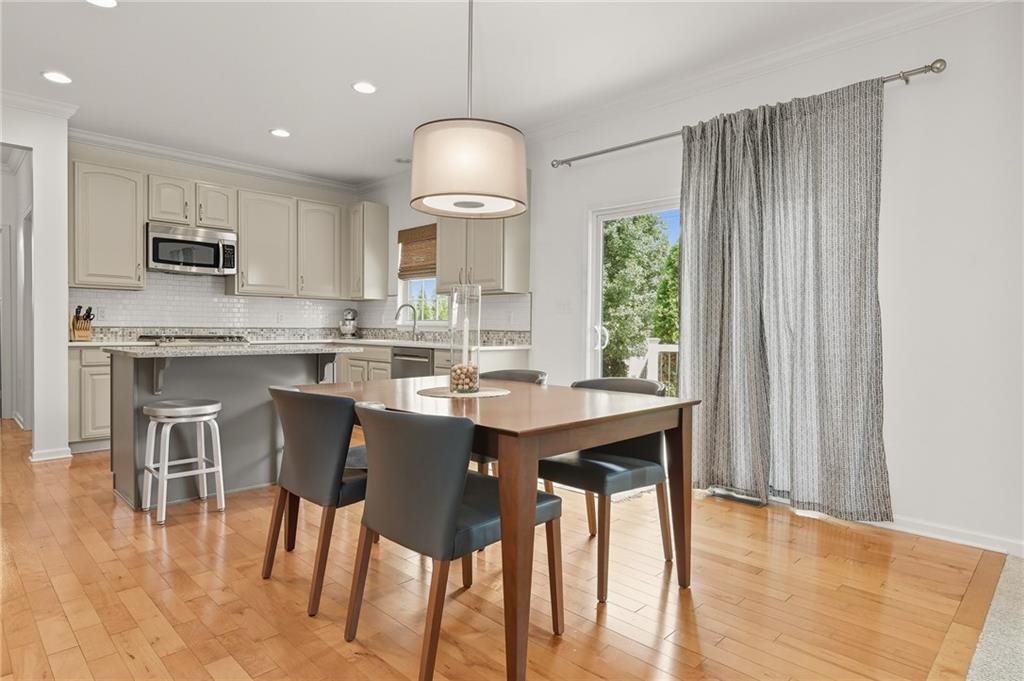 207 Windham Lane Mars, PA 16046 - Photo 9 of 43 a kitchen with kitchen island granite countertop a sink and a stove