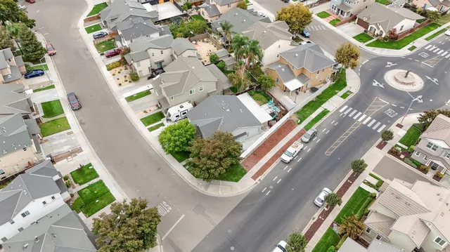 an aerial view of a residential apartment building in a city