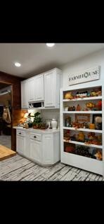 2702 Blue Creek Road La Vernia, TX 78121 - Photo 16 of 31 a kitchen with a refrigerator and a stove