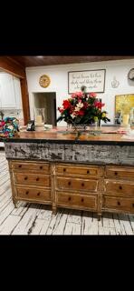 2702 Blue Creek Road La Vernia, TX 78121 - Photo 27 of 31 a view of room with kitchen island and wooden floor