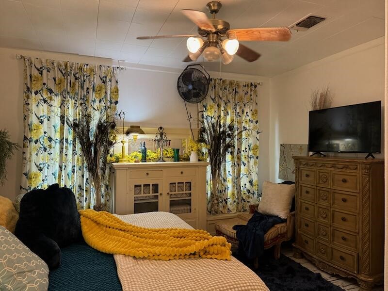 2702 Blue Creek Road La Vernia, TX 78121 - Photo 8 of 31 a living room with furniture and a flat screen tv