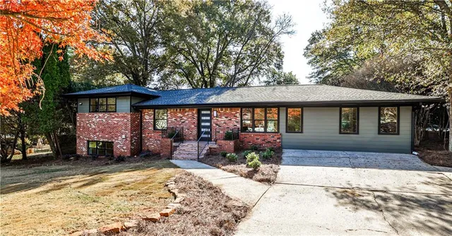 a front view of a house with a patio