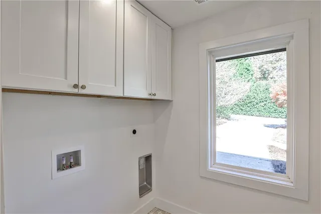 a view of window with kitchen view