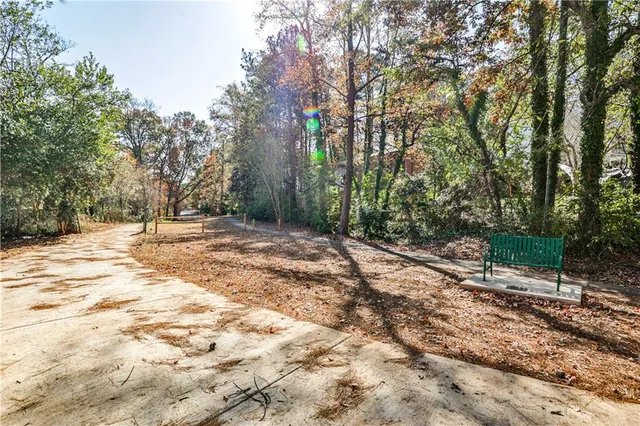 a backyard of a house with lots of green space