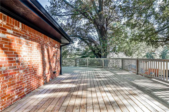 a view of outdoor space with deck and backyard
