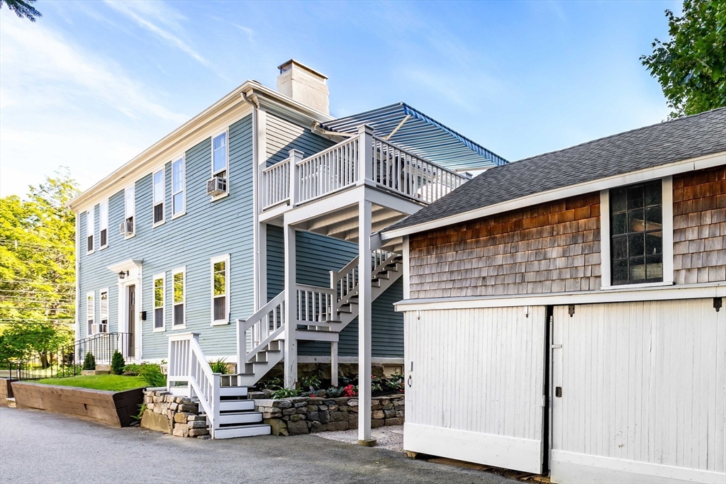 138 State Street, Unit 1 Newburyport, MA 01950 - Photo 3 of 35 a view of a house with a iron gate