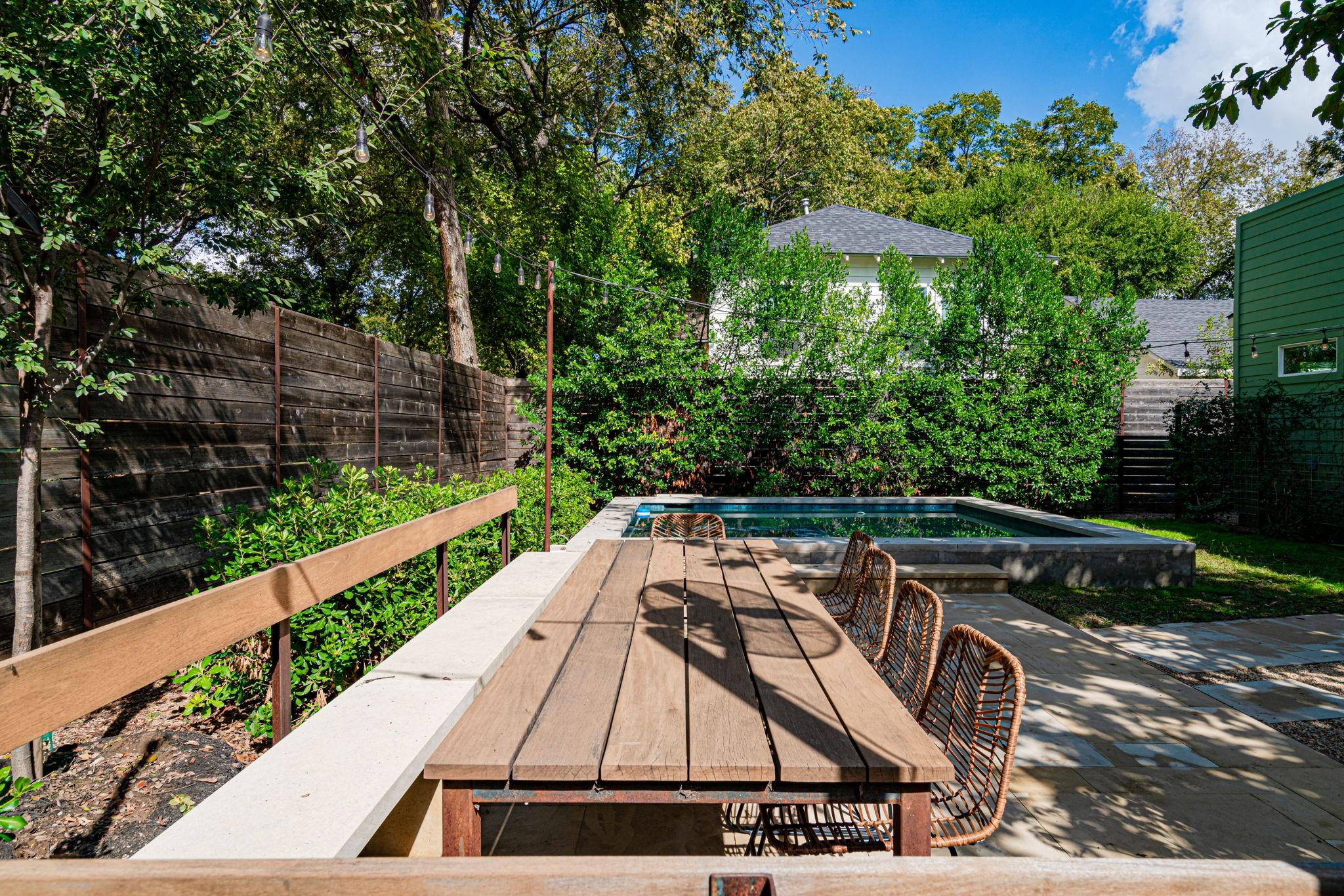 72 San Saba Street Austin, TX 78702 - Photo 19 of 23 Wooden terrace with a fenced backyard and a patio area