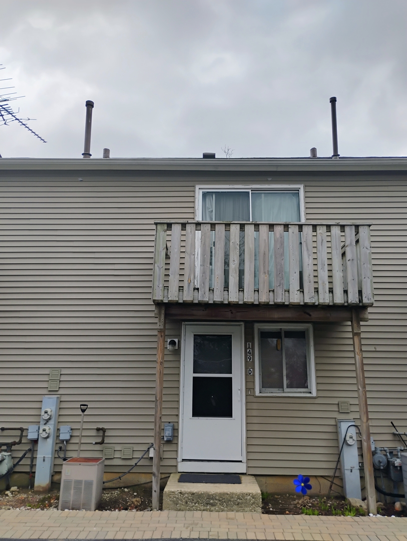 149 Forest Avenue, Unit D Fox Lake, IL 60020 - Photo 5 of 5 a view of wooden house with street