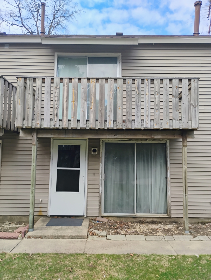 149 Forest Avenue, Unit D Fox Lake, IL 60020 - Photo 3 of 5 a front view of a house