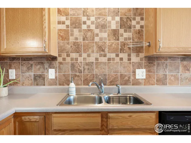 a view of a sink and a window