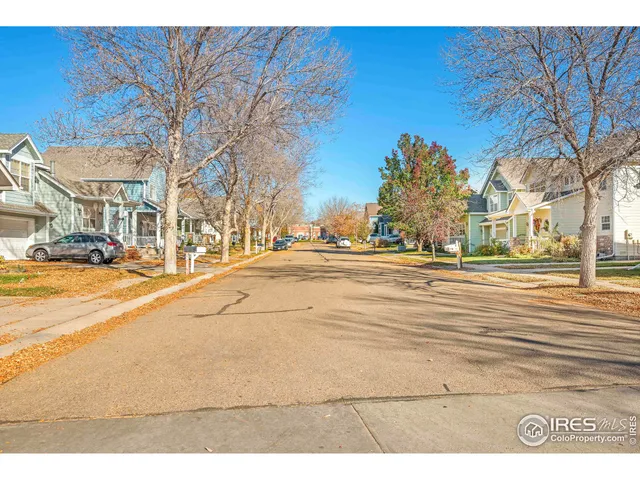 a view of a house with backyard porch and sitting area