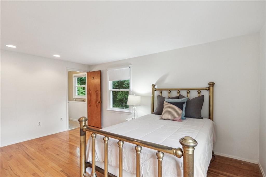 211 Wyngate Road Coraopolis, PA 15108 - Photo 19 of 31 a bedroom with a large bed and a large window