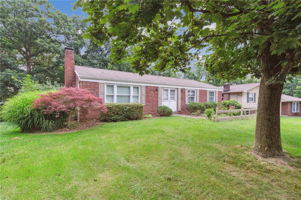 211 Wyngate Road Coraopolis, PA 15108 - Photo 2 of 31 a view of a house with backyard and garden