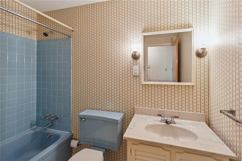 211 Wyngate Road Coraopolis, PA 15108 - Photo 22 of 31 a bathroom with a sink a toilet and shower