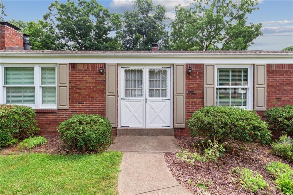 211 Wyngate Road Coraopolis, PA 15108 - Photo 3 of 31 front view of a house with a yard