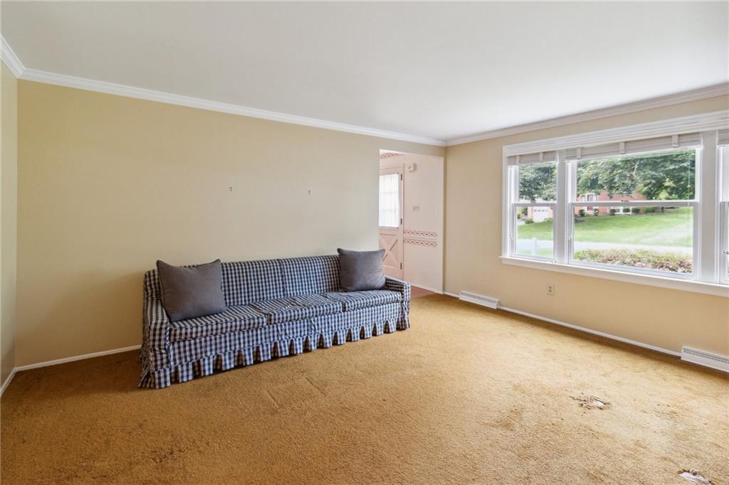 211 Wyngate Road Coraopolis, PA 15108 - Photo 6 of 31 a living room with furniture and a window