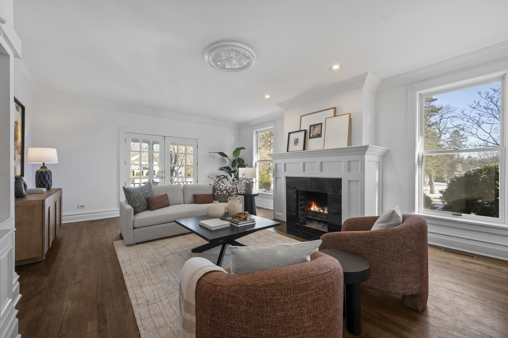 399 East Deerpath Road Lake Forest, IL 60045 - Photo 11 of 61 a living room with furniture and a fireplace