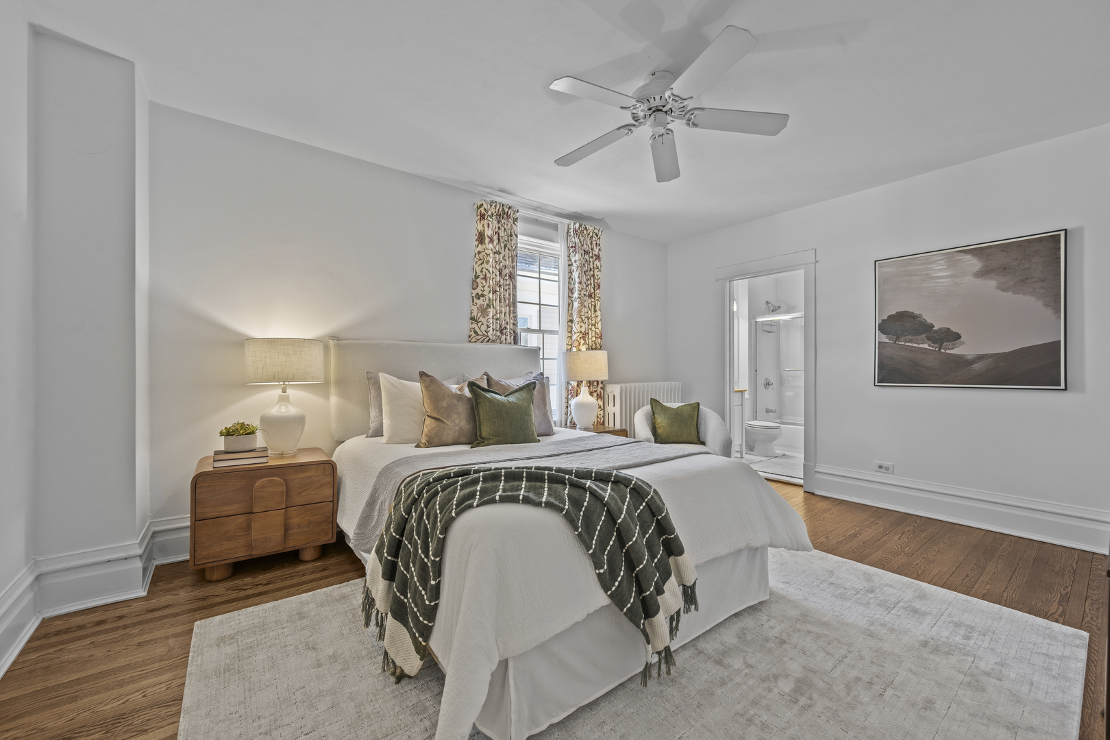 399 East Deerpath Road Lake Forest, IL 60045 - Photo 35 of 61 a bedroom with a large bed and a chandelier