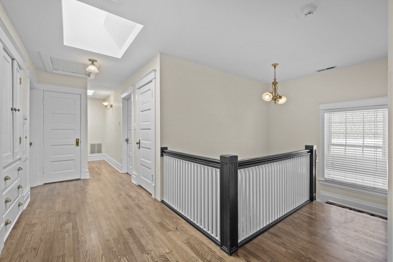 399 East Deerpath Road Lake Forest, IL 60045 - Photo 40 of 61 a view of a hallway with wooden floor
