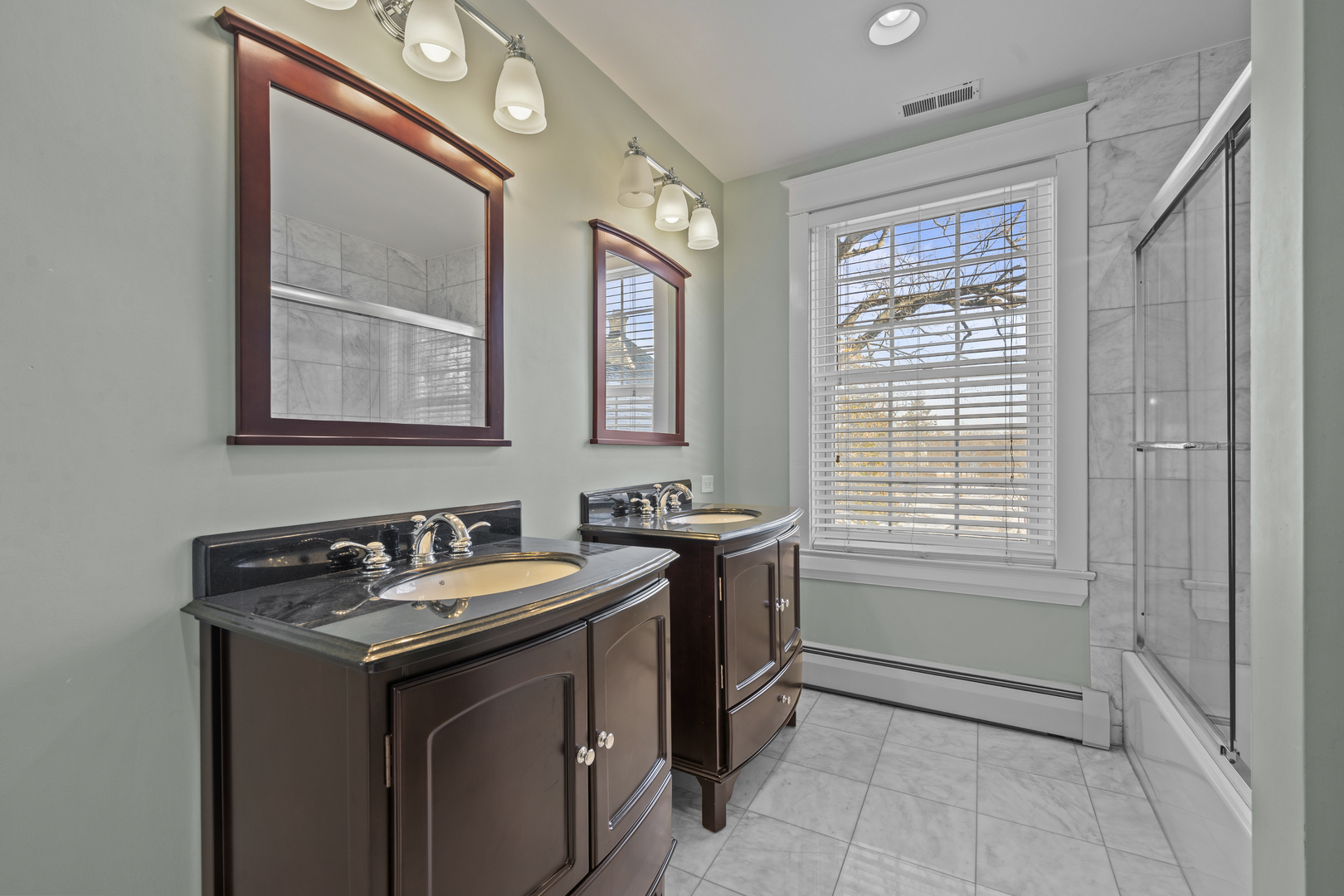 399 East Deerpath Road Lake Forest, IL 60045 - Photo 46 of 61 a bathroom with a sink and a vanity