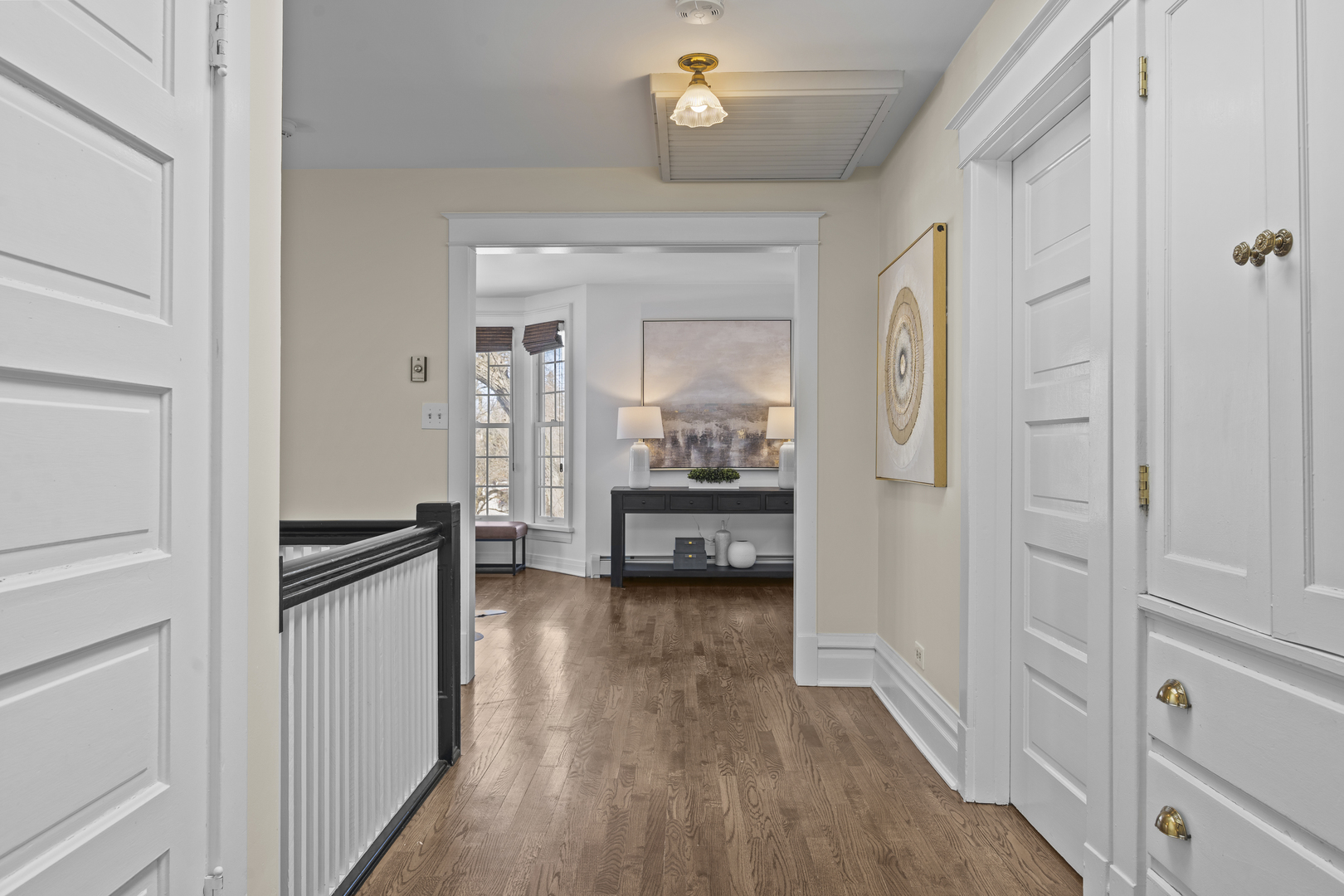 399 East Deerpath Road Lake Forest, IL 60045 - Photo 50 of 61 a view of a hallway with wooden floor and a kitchen