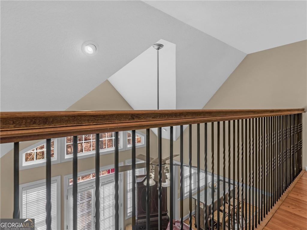 355 Parker Road Covington, GA 30014 - Photo 33 of 60 a couple of wooden floor in a balcony
