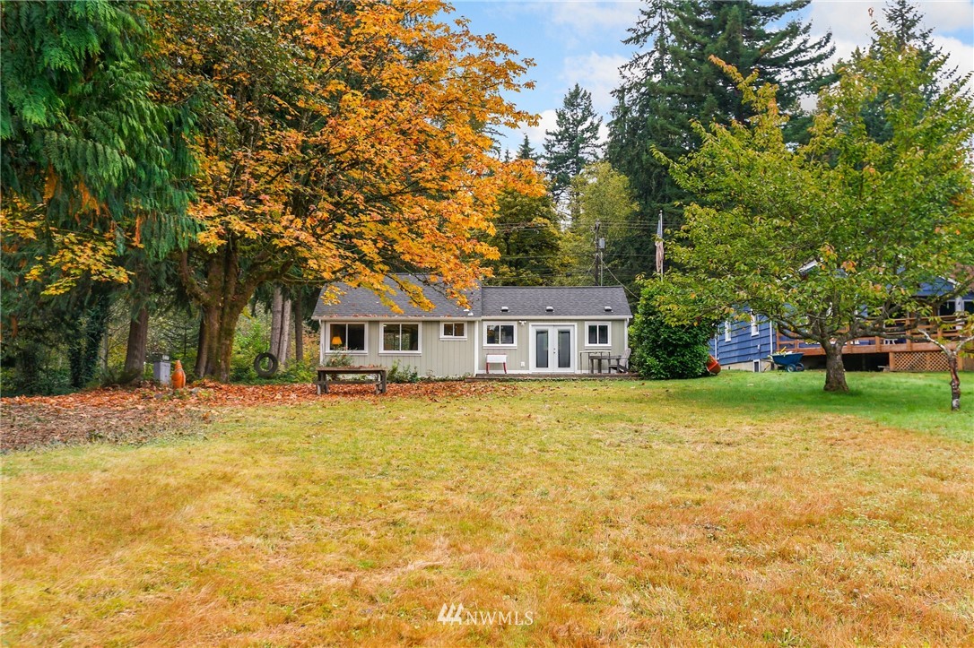 4717 Lerch Road Snohomish, WA 98290 - Photo 3 of 25 a front view of a house with a garden